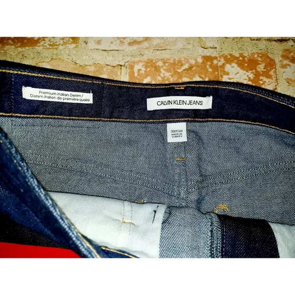 Calvin Klein Jeans Premium Italian Denim Skirt - Vinyl Sleeve Logo - Dark Rinse