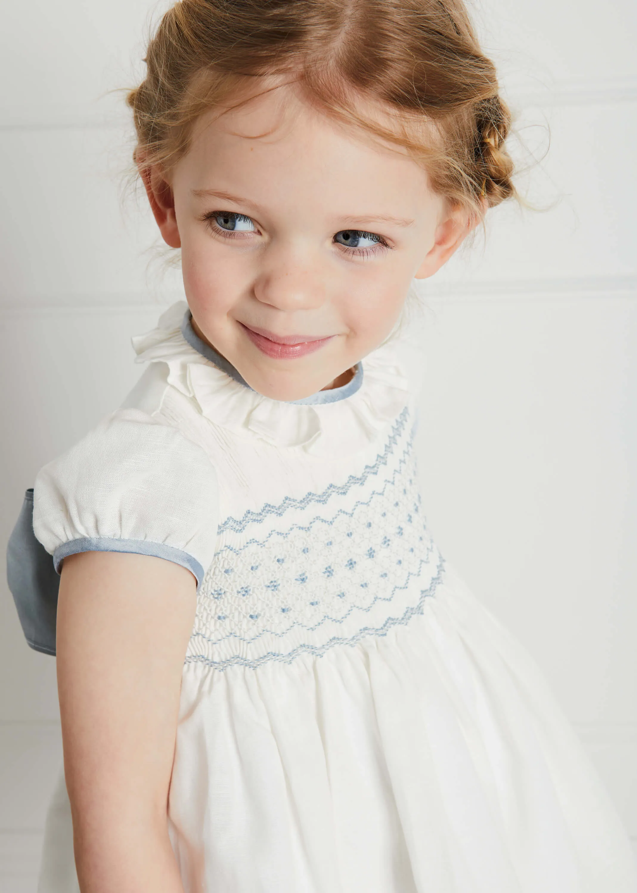 Ivory Hand Smocked Occasion Dress with Blue Details (12mths-8yrs)