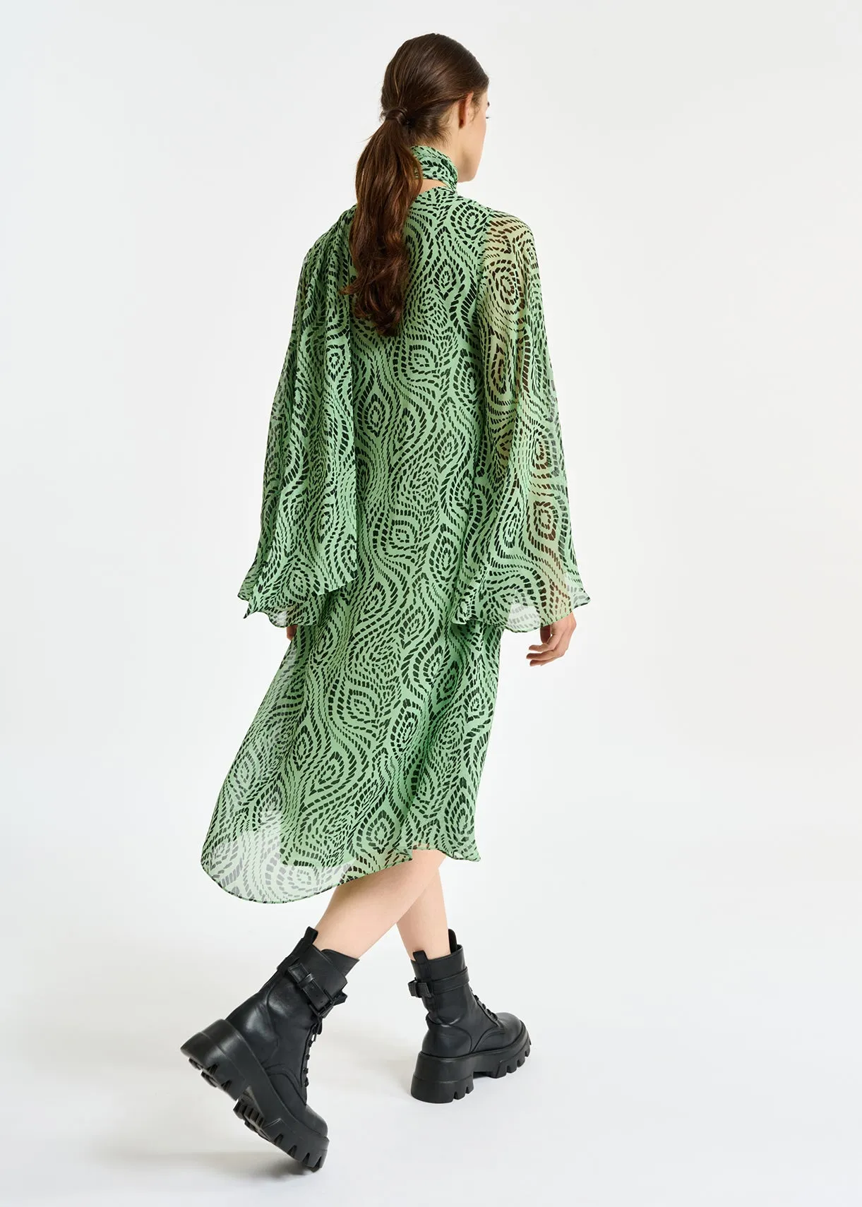 Mint green midi-length dress with geometric print