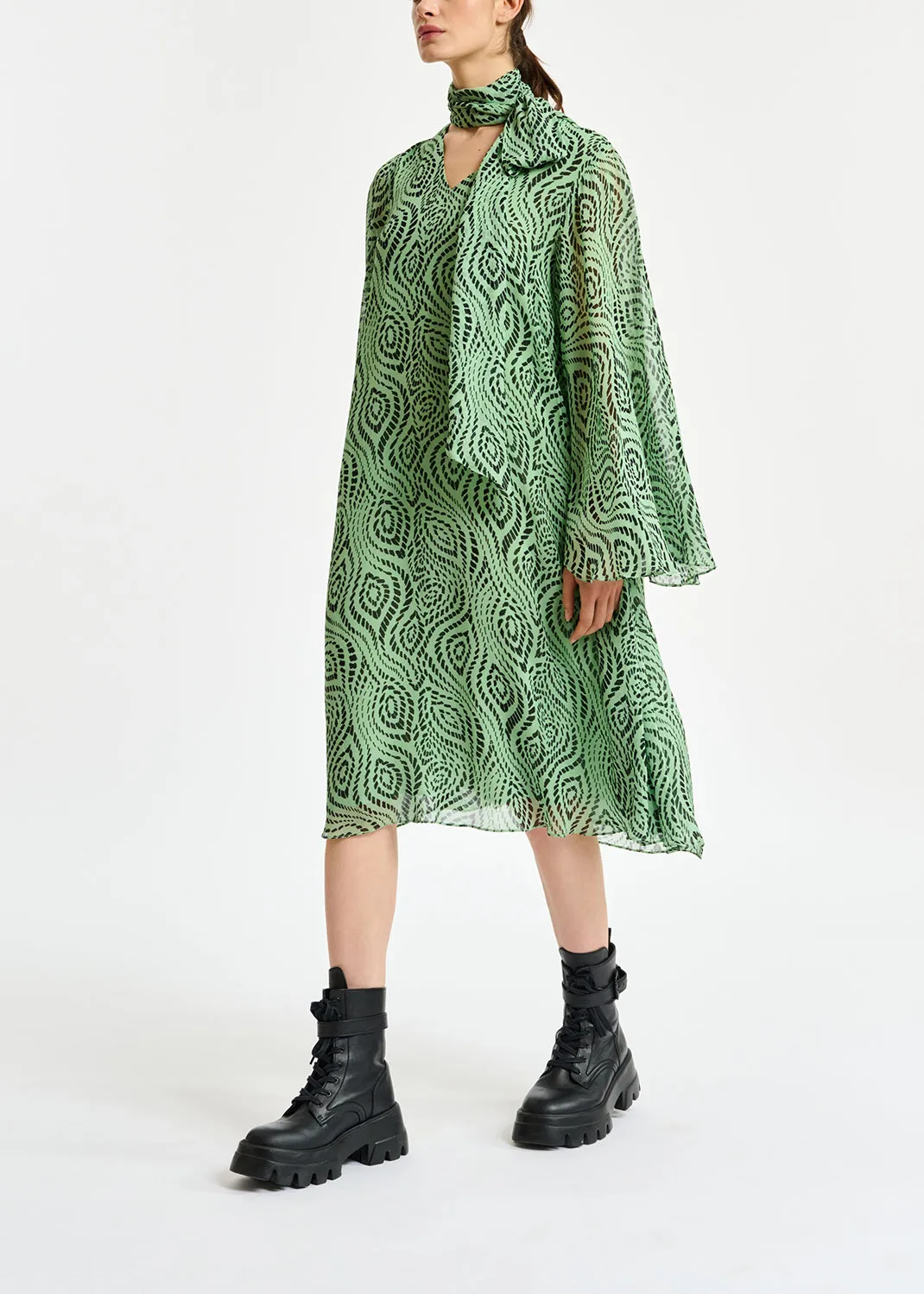 Mint green midi-length dress with geometric print
