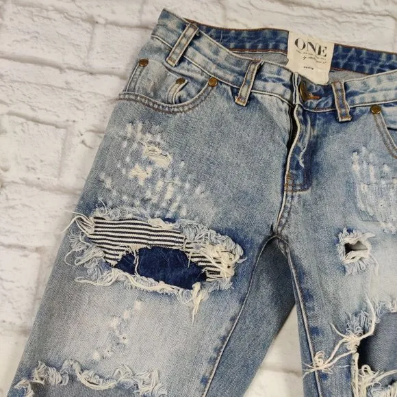 One teaspoon Trashed free birds jeans denim low rise skinny leg distressed sz 24
