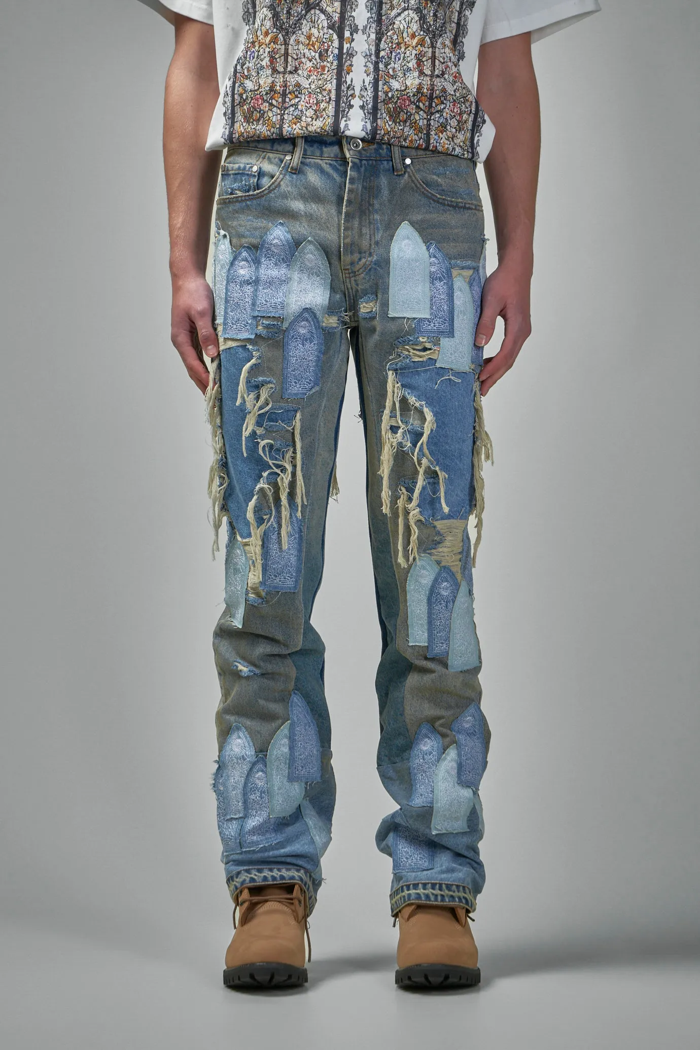 Patched Arch Repaired Blowout Denim