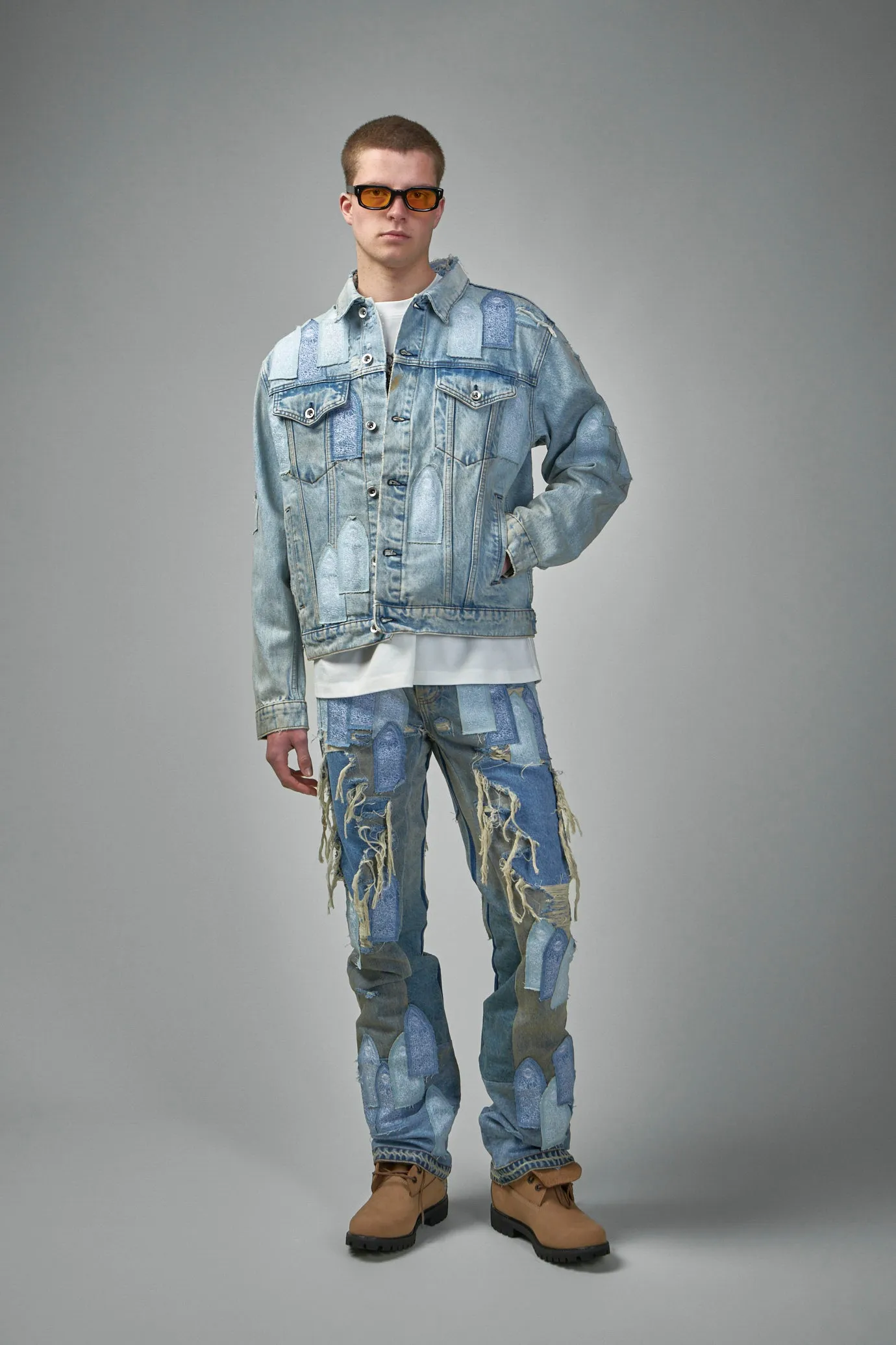 Patched Arch Repaired Blowout Denim