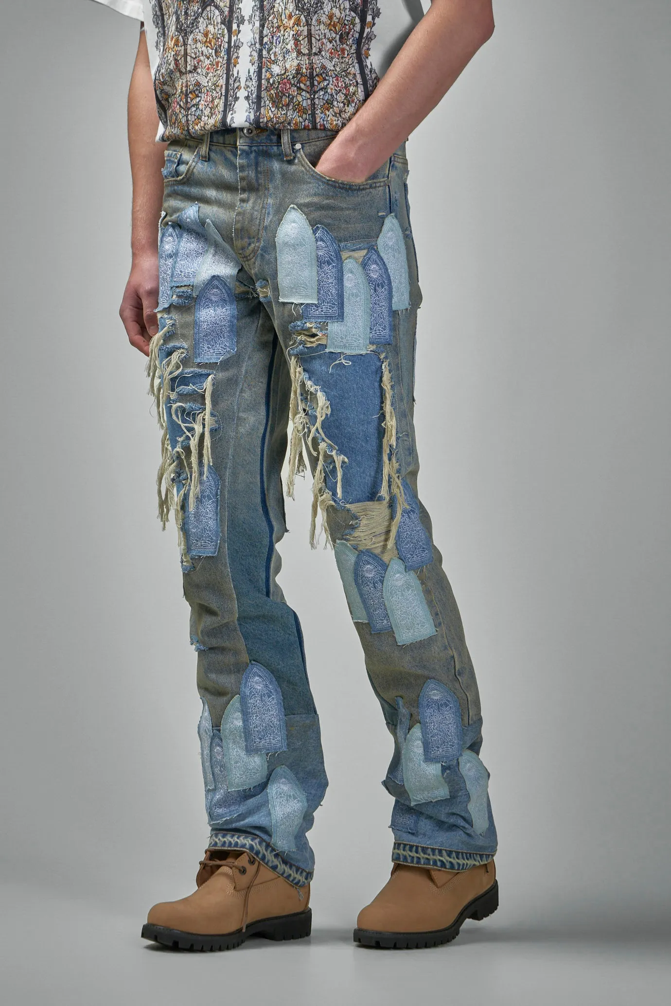 Patched Arch Repaired Blowout Denim