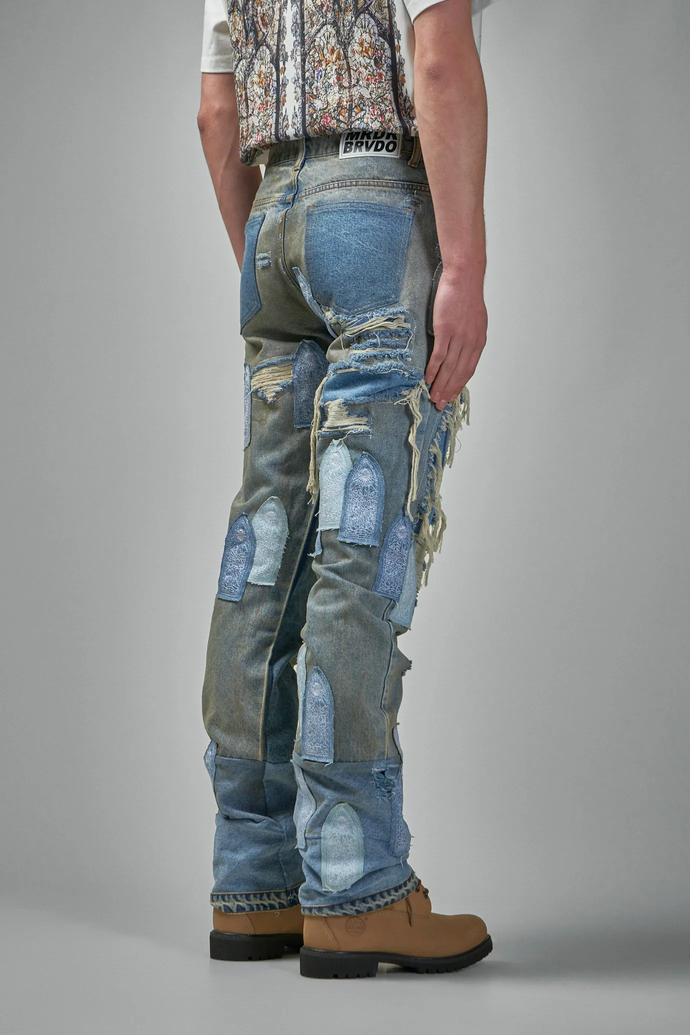 Patched Arch Repaired Blowout Denim